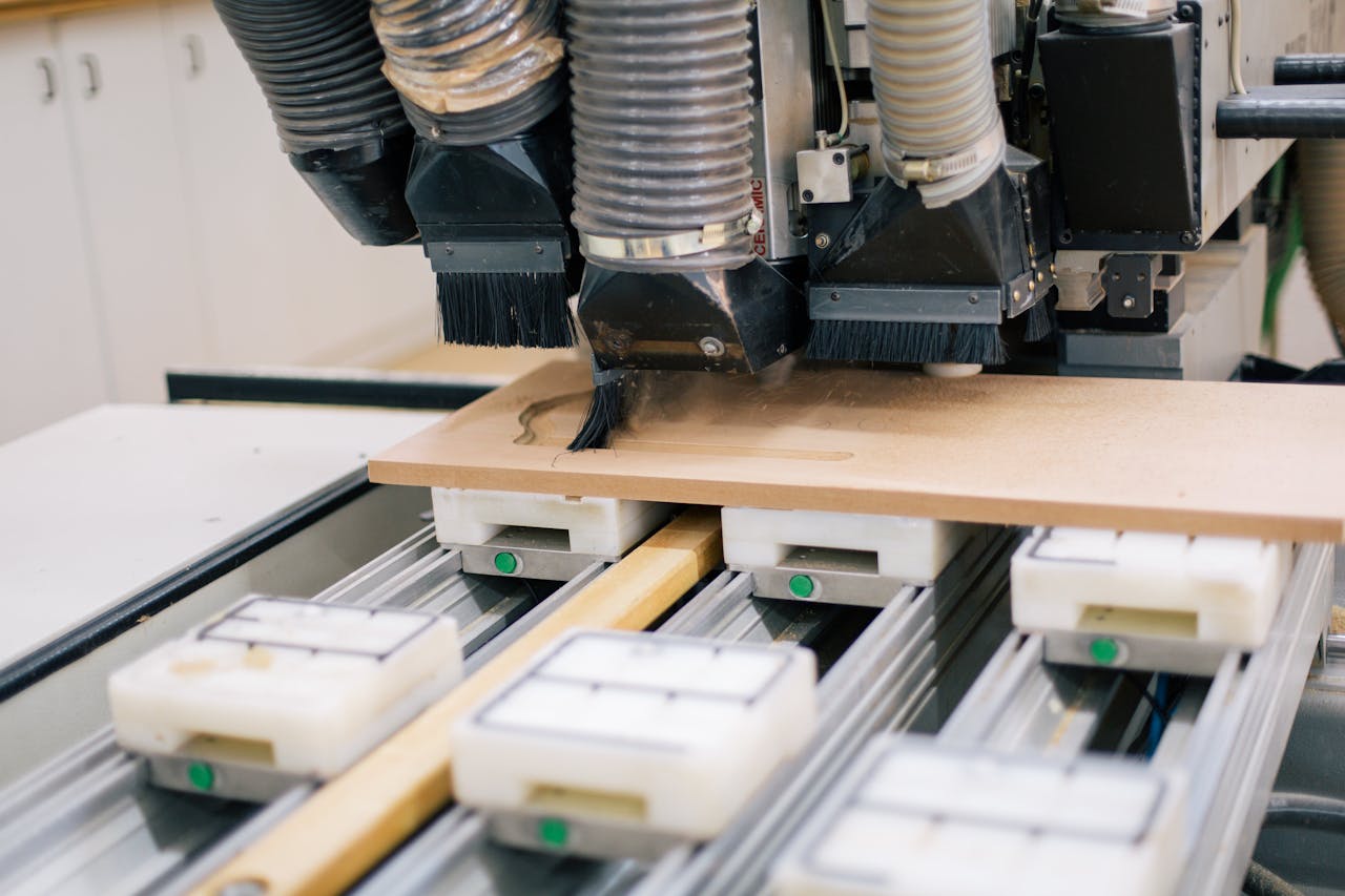 Crafting Captivating Headlines: Your awesome post title goes here Close-up of a CNC machine carving wood with precision in a workshop setting.